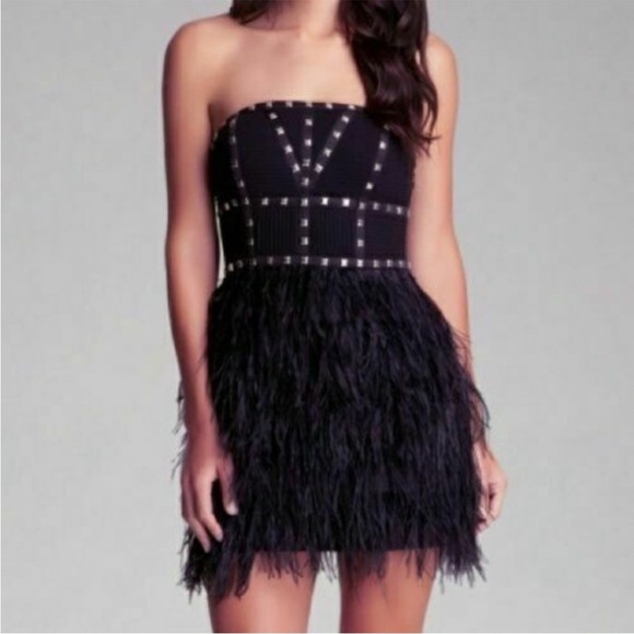 bebe Dresses & Skirts - Bebe Black Studded Isis Feather Dress …